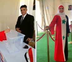 صور لسيدة ترتدي زي العلم السوري تنتخب في الأردن تشغل مواقع التواصل