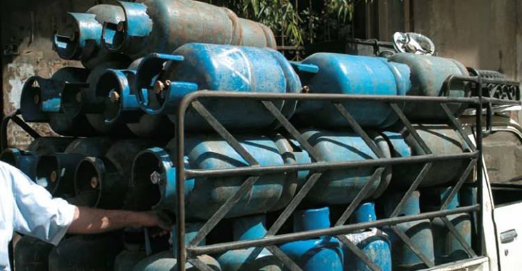 قرارات عن المكتب التنفيذي في اللاذقية تخص تحديد أسعار اسطوانات الغاز المنزلي والصناعي ومواد البناء .